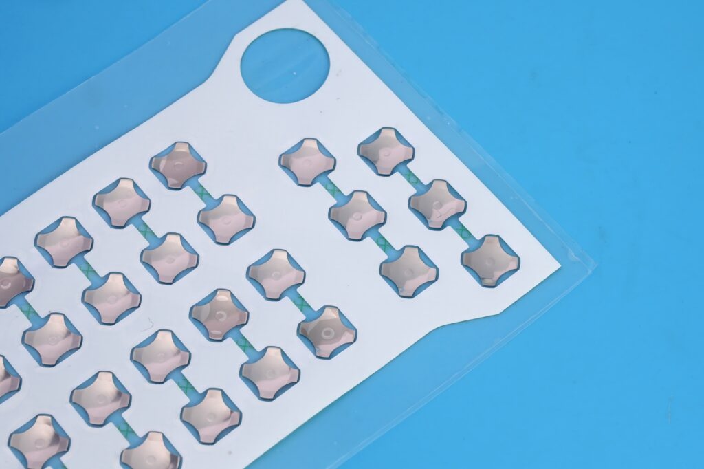 Metal dome array for automotive electronics, Metal dome array