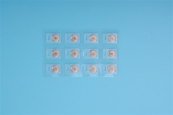Real PET carrier with twelve round metal domes in a repeated layout