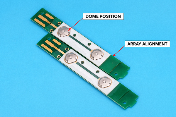 Illustrative PCB strip showing metal dome positions and carrier-to-board alignment